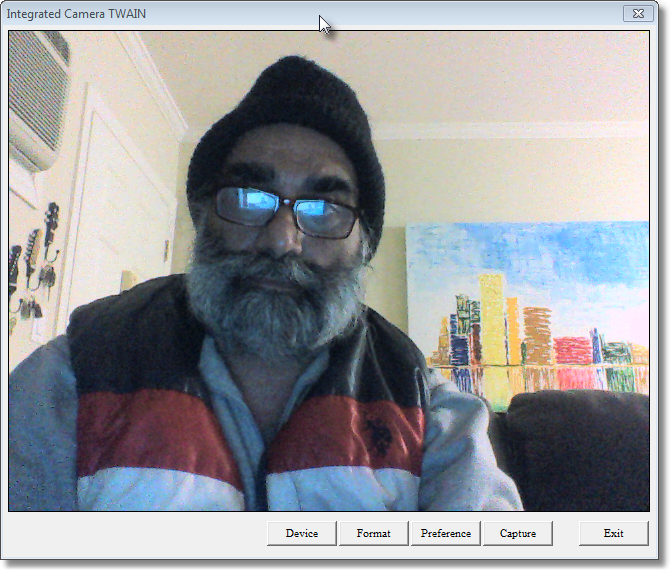 My laptop's camera acts as a scanner also, which has captured me in its scanner interface, clicking on <Capture> button will plush this captured image in VouchScan. My laptop's camera acts as a scanner also, which has captured me in its scanner interface, clicking on <Capture> button will plush this captured image in VouchScan.